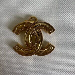 Chanel Stamped Gold Toned CC Zipper Pull Charm